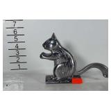 Metal squirrel nut cracker.