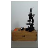 Tasco Deluxe microscope in wooden box. Microscope