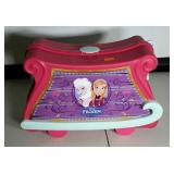 "FROZEN" doll clothes storage bin with a few