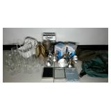 Glassware, backpack, floodlights, frames, hat,