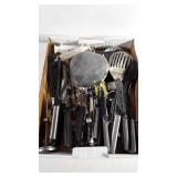 Lot of kitchen utensils.