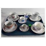 Tea cups and matching saucers.