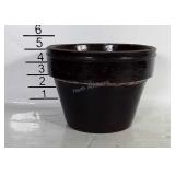Brown stoneware planter. Stands about 4.5 inches