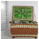 Sewing basket with sewing supplies.