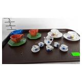 Tiny glass tea sets.