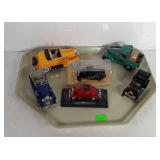 Model cars, varying sizes and conditions.