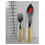 Decorative serving knife and fork.