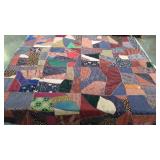 Crazy quilt, knotted, silky fabrics, some wear as