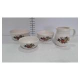 Four pieces of McCoy Pottery - water pitcher and