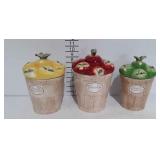 Three Pfaltzgarph delicious apple canisters, chip