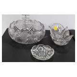 Three cut glass bowls, small one has chip