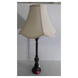 Candlestick style lamp with cloth shade