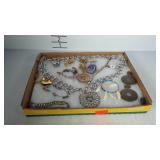 Small flat of costume jewelry