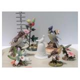 Birds and floral figurines,  one is a bell,  7