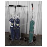 Two Carts with Oxygen tanks, tanks fill heavy but