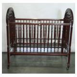 Simmons baby crib with drop down side. A