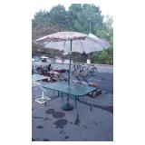 Glass top patio table, with umbrella, and