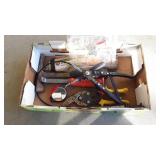 Box flat, with pruners, hammer/pick, mirror,