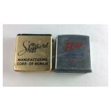 Two advertising rulers one is Zippo