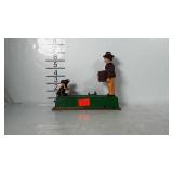 Old metal monkey bank. Monkey pops up when you
