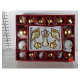 Lot of white and gold Christmas ornaments. All