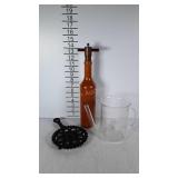 Kitchen goods, iron trivet, wooden wine bottle