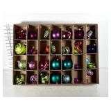 Lot of colorful plastic Christmas ornaments.
