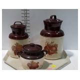McCoy beanpot and two canisters, damage on a lid