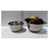 Two stainless measuring bowls and Artificial