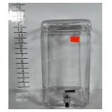 Glass drink dispenser. Has a few chips lip of jar