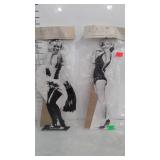 Marilyn Monroe cardboard cutouts with stands.