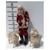 Vintage Santa Claus figure with two sheep