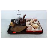 Duck decoys, statue and a box of shells