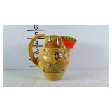 Small pottery pitcher, artist signed, made in