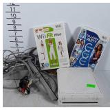 Wii game console + 2 games. Not tested by us.