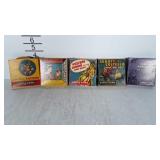 16mm movie reels. See pictures  for titles.