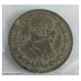 Old Mexican silver dollar