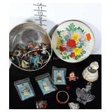 Vintage tin with costume jewelry, including some