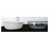 Two round FireKing casserole dishes.