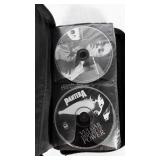 CD organizer full of CDs. 60+ CDs.