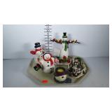 Snowmen, candleholders and a secret snowglobe,