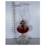 17" oil lamp with oil. Nice shape.