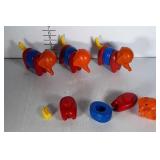 4 Tupperware Toy Elephants.