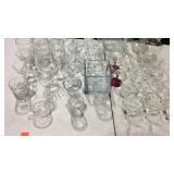 Group lot of clear glassware cups, stem glass,