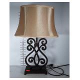 Heavy metal lamp. Base in great shape. Shade has