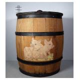Painted wooden barrel with baby pigs on the