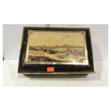 Decorative tin with horse city scene