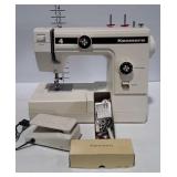 Kenmore sewing machine with attachments and