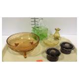 Colored glass- footed bowl, green handled basket,