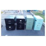 Group of four two drawer metal filing cabinets